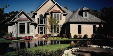 Traditional Brick and Stone custom home exterior, Kraus Design Build and Kraus Plans