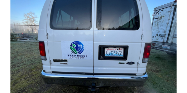 Volunteer delivering food donations.