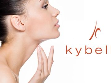 Profile of woman touching her chin with Kybella logo.