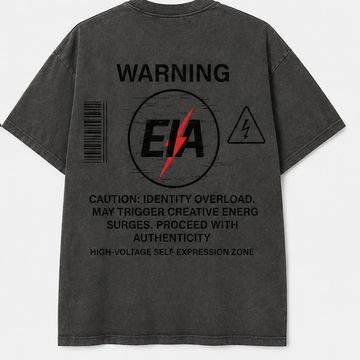Black t-shirt with a bold warning graphic and text on the back.