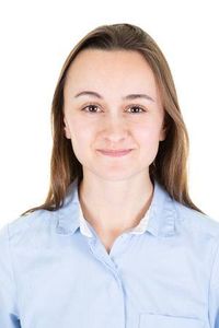 Woman smiling for a passport photo