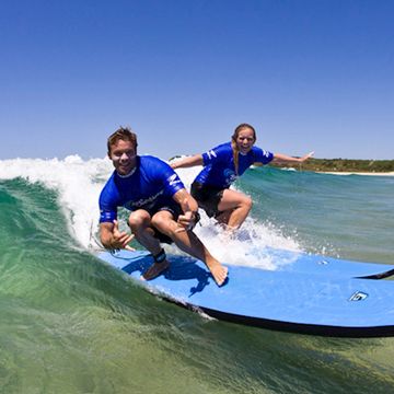 Two surfers on a wave at Maroubra beach