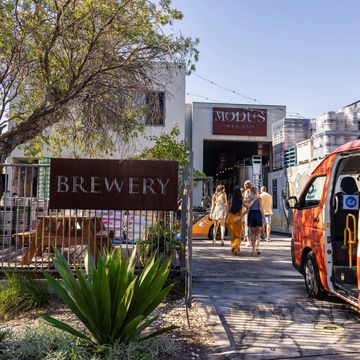 People walking into Sydney's Modus brewery