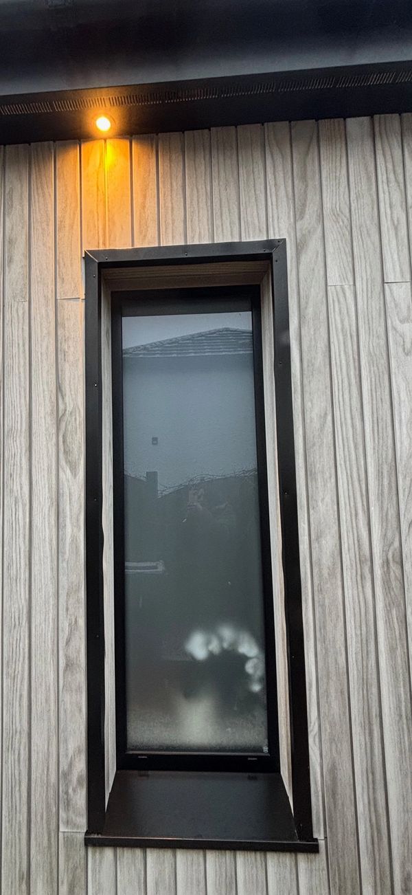 feature window russwood larch eaves lighting