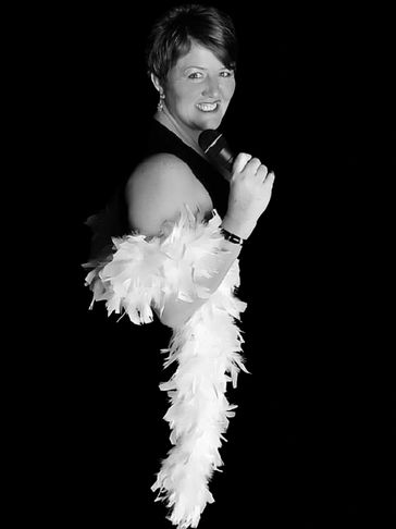 Vintage Sandy Nitch host of the Blue Smoke Lounge and singer-songwriter