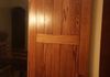 oak barn-door-style sliding interior shutters