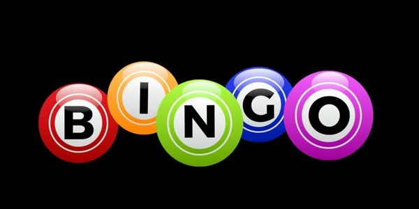 Colorful bingo balls spelling BINGO on a black background.