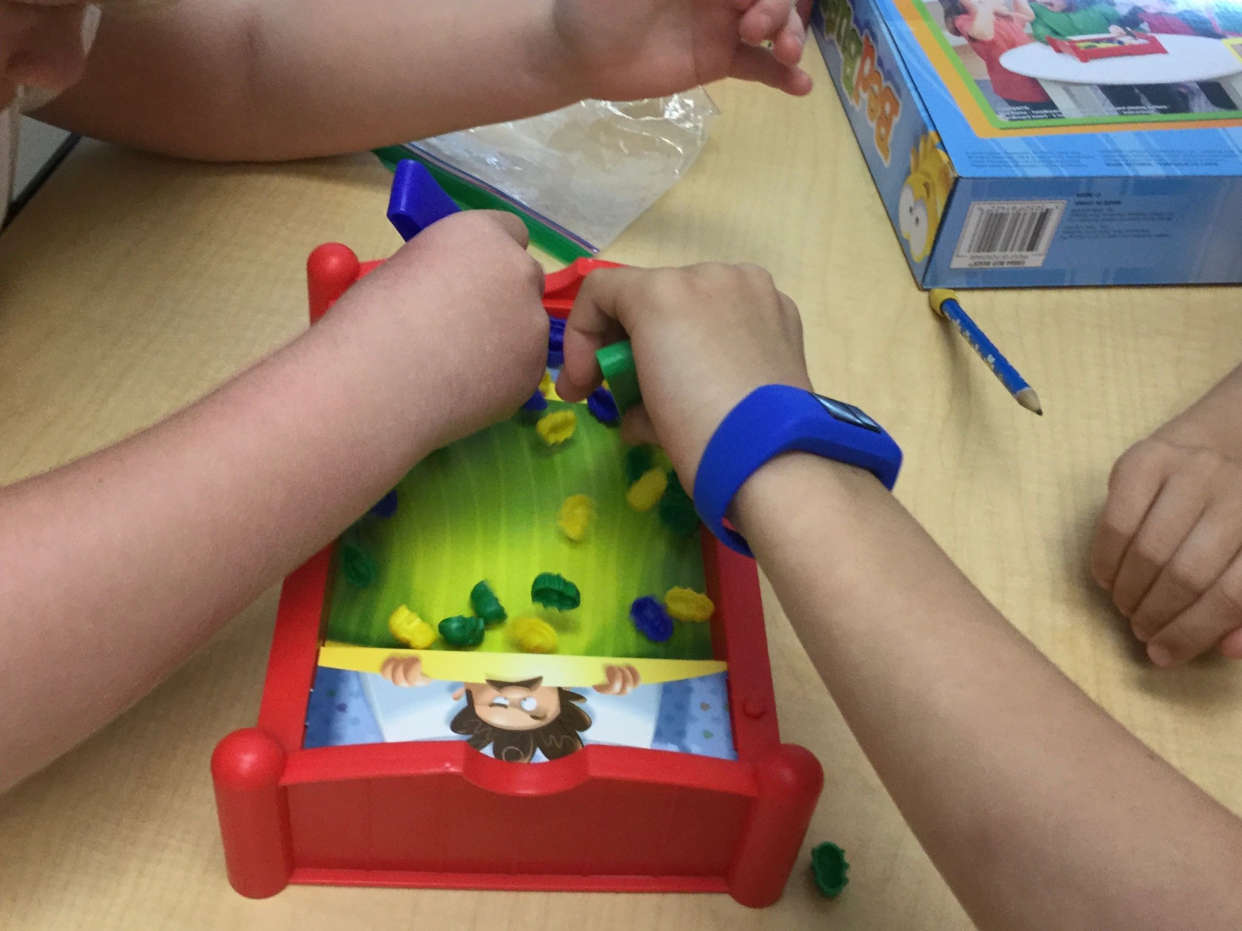 Child using a tabletop therapy activity