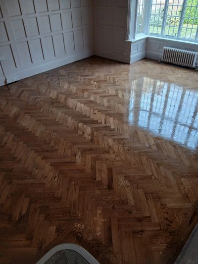 Stylish staircase with patterned carpet runner and painted steps in a modern hallway