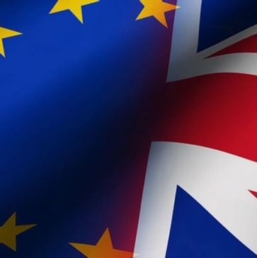 Blended image of the European Union and United Kingdom flags.