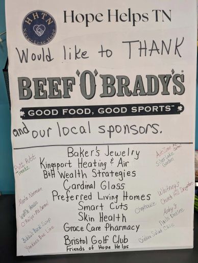 Sign thanking Beef O'Brady's and local sponsors for their support.