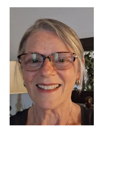 Canadian watercolor artist Kathryn Taylor smiling in her studio, creator of Inspired Watercolours.