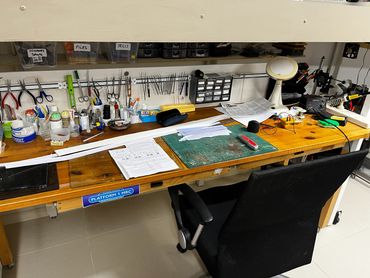Workbench
On wheels for moving - it sits under the layout