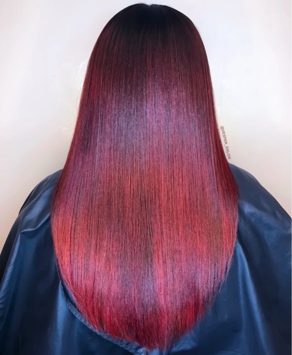 Image of red hair color performed by Vesper Gary, Owner and Master Stylist of VESPER SALON.