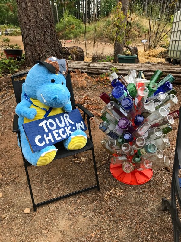 Blue the BHB Community Club mascot welcoming guests and helping out with the 3rd annual tour check i