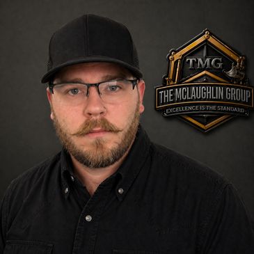 Bearded man in glasses and black cap with The McLaughlin Group logo.