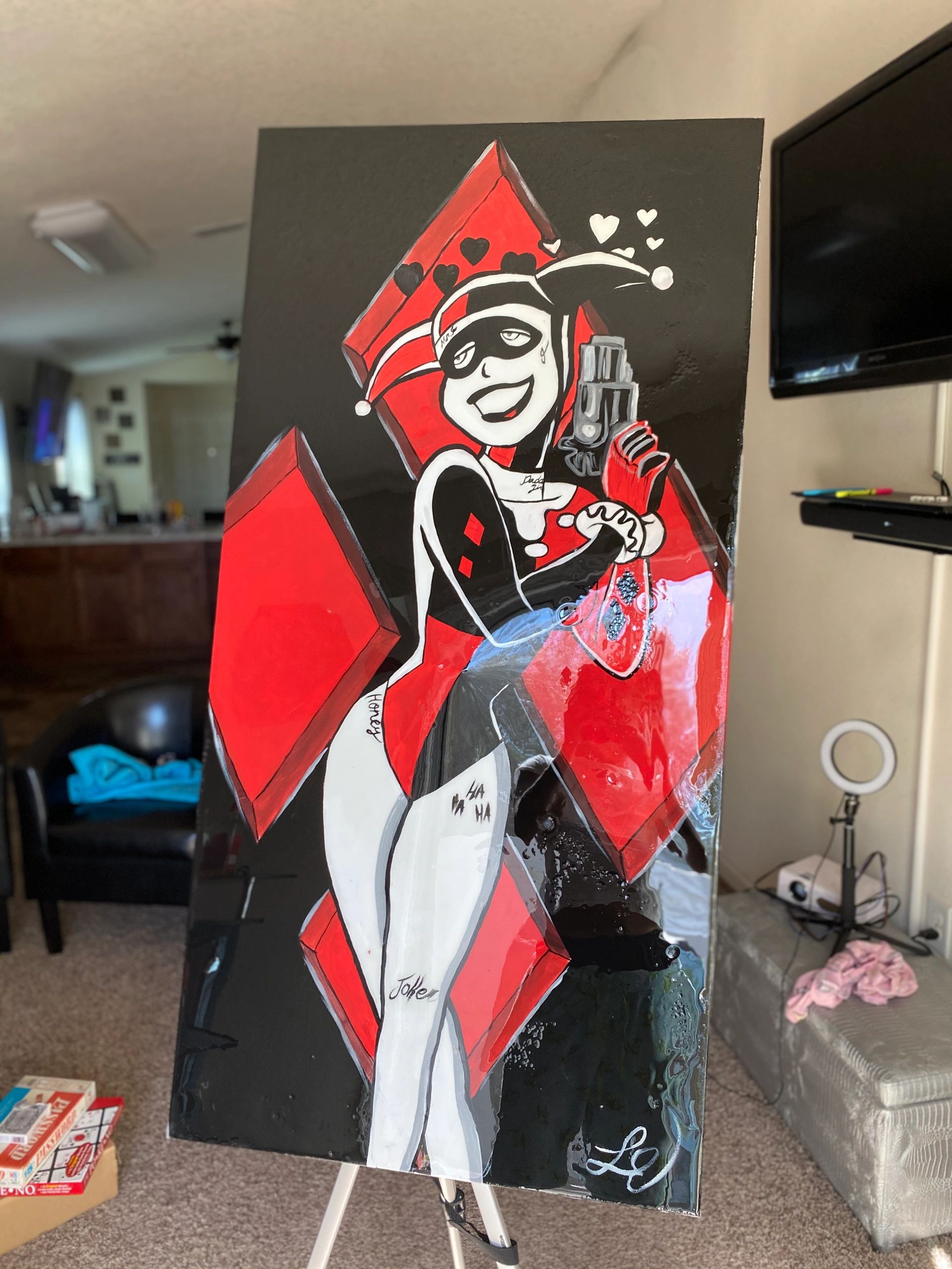 Harley Quinn painting done with a glossy resin finish.