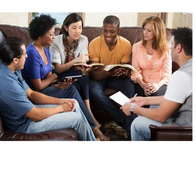 A group pf people smiling and studying the bible together.