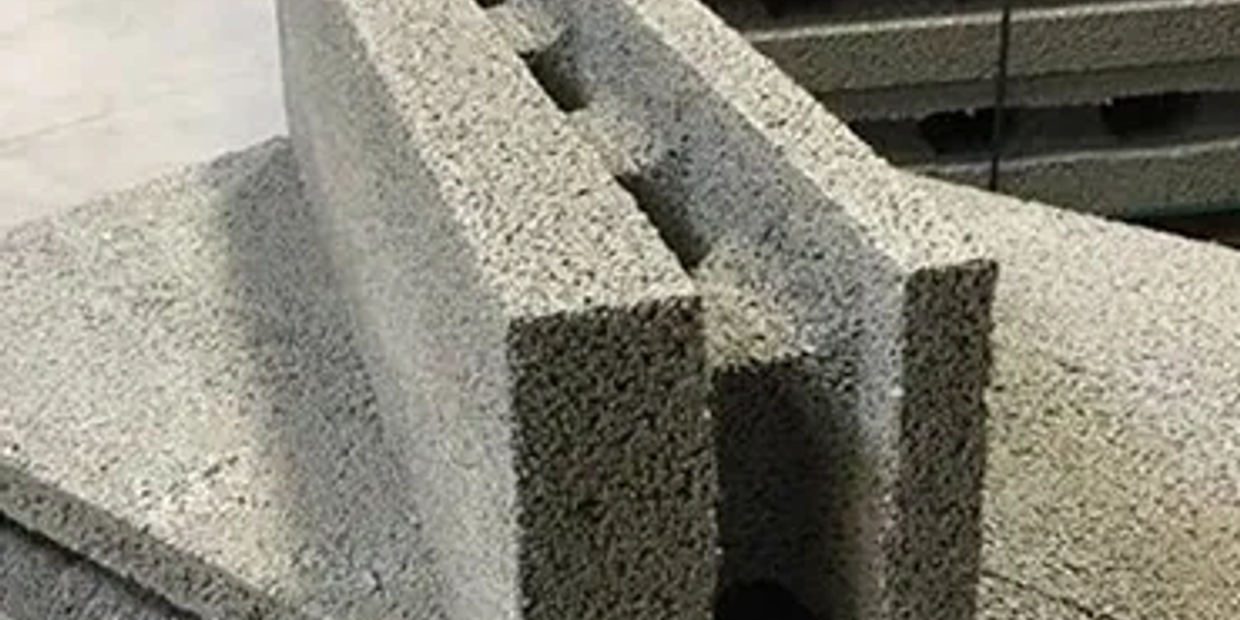 Gray concrete blocks stacked closely.