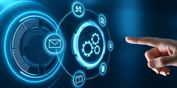 Hand interacting with futuristic digital interface icons in blue holographic style.