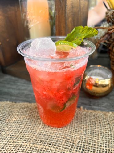 A delicious and very fresh berry mojito! This one is made with fresh muddled strawberries and mint w