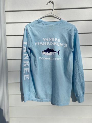 Light blue long-sleeve shirt with fishing logo and text.