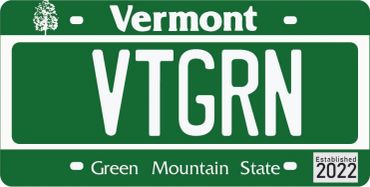 Green Vermont license plate with VTGRN text and 2022 date.