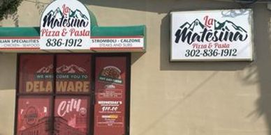 La Matesina Pizza &amp; Pasta storefront with signage.