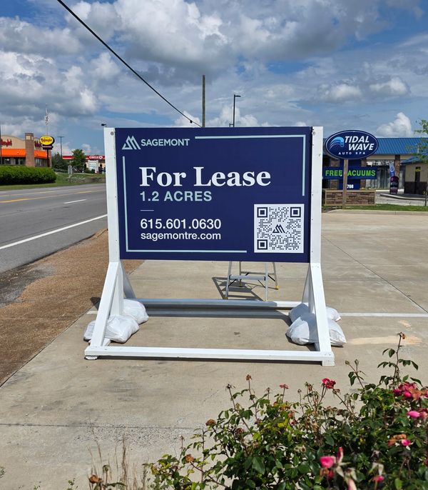 Sign advertising 1.2 acres for lease by Sagemont.