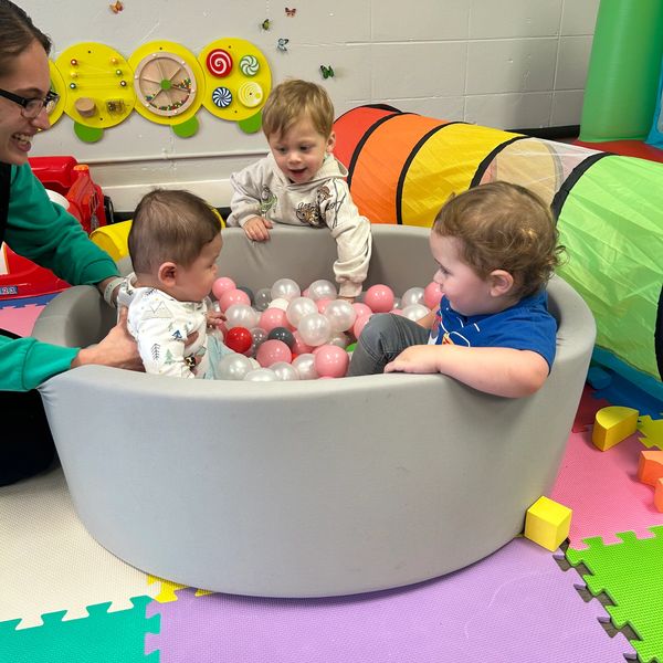 Children in a small ball pit