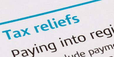 Close-up of 'Tax reliefs' text on a document.