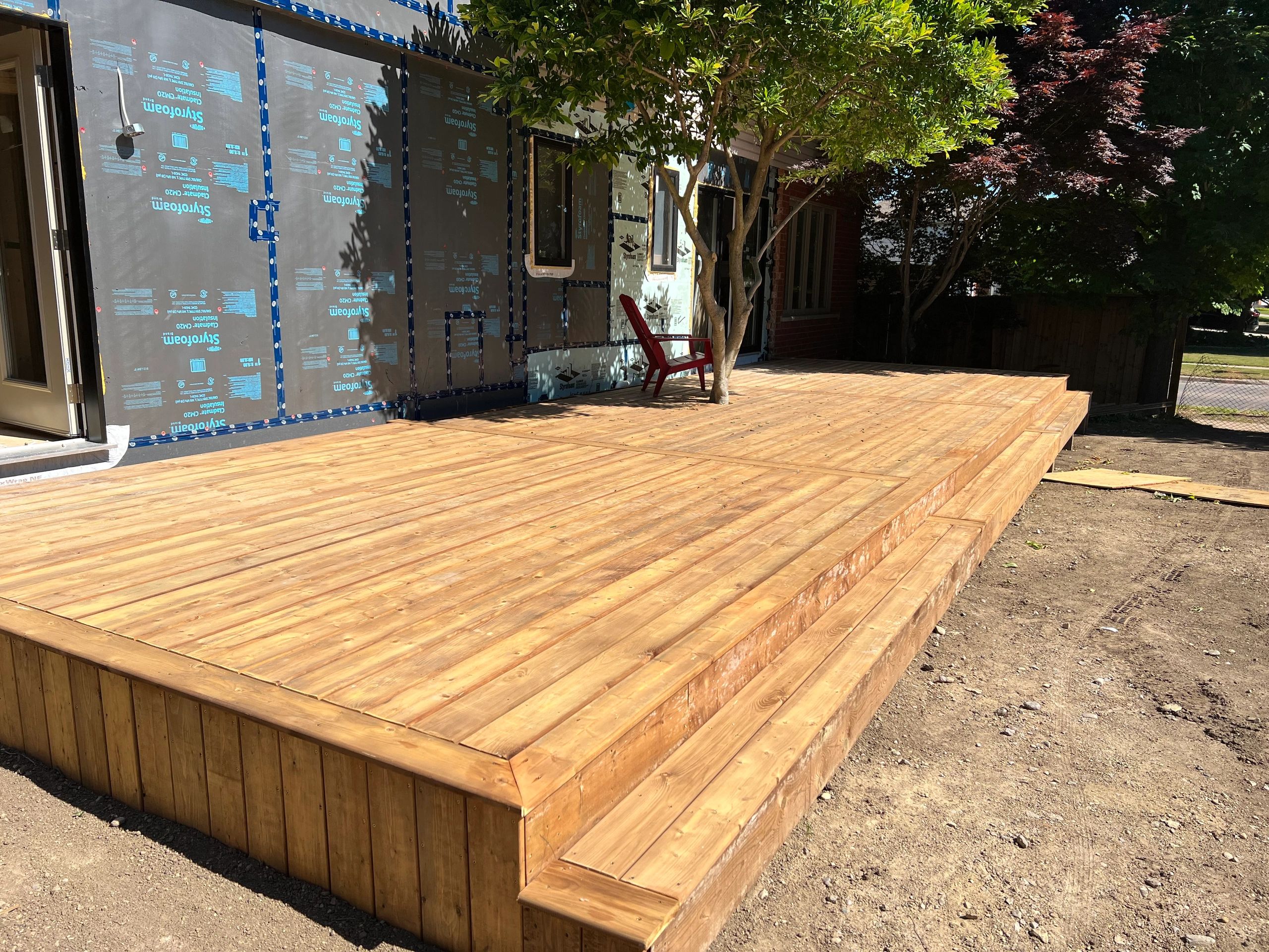 Pressure treated deck with breaker board down centre and border all around
