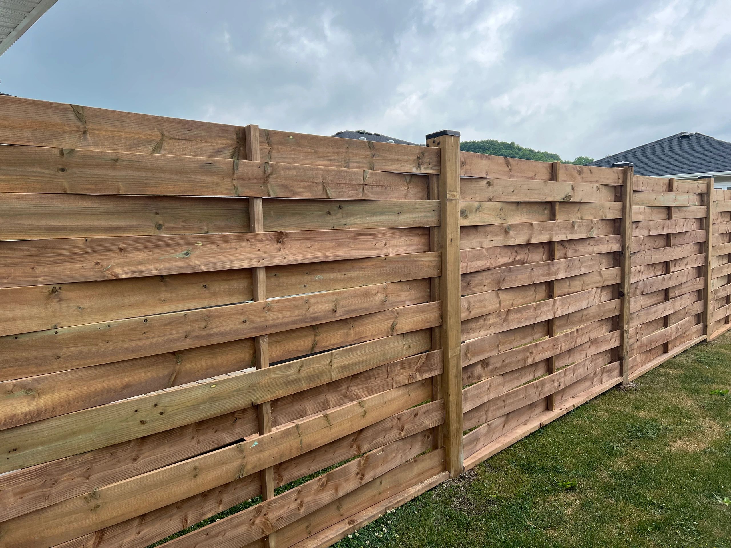 6ft basket weave style fence installation in London Ontario