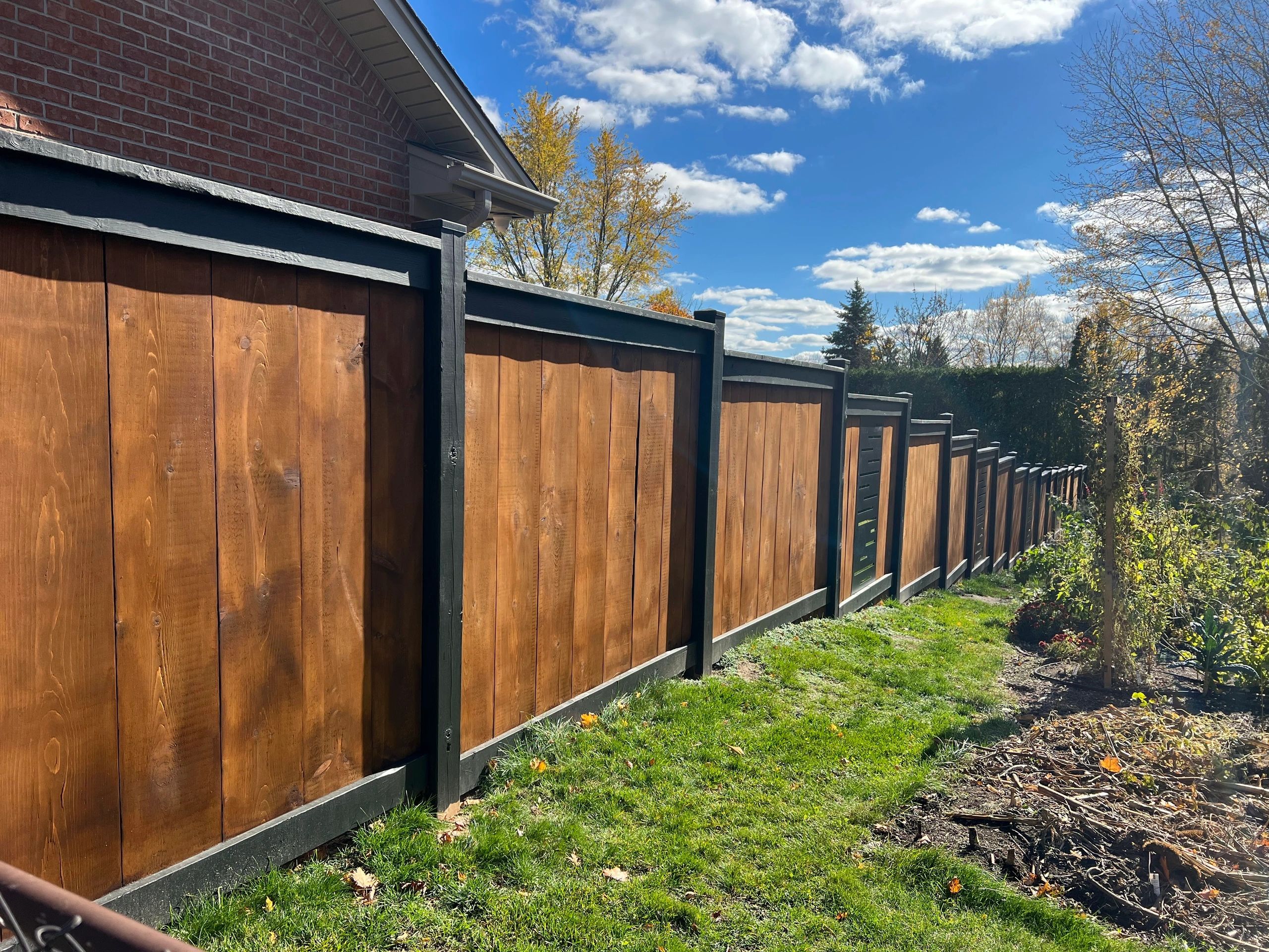 7ft pine fence boards with 2x6 framing and stained boards, London Ontario