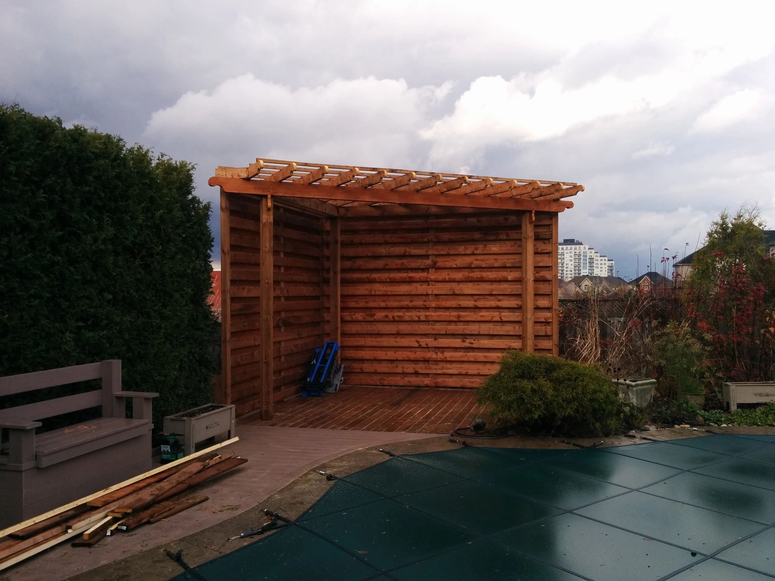 Corner built pergola with extra privacy on sides, London Ontario