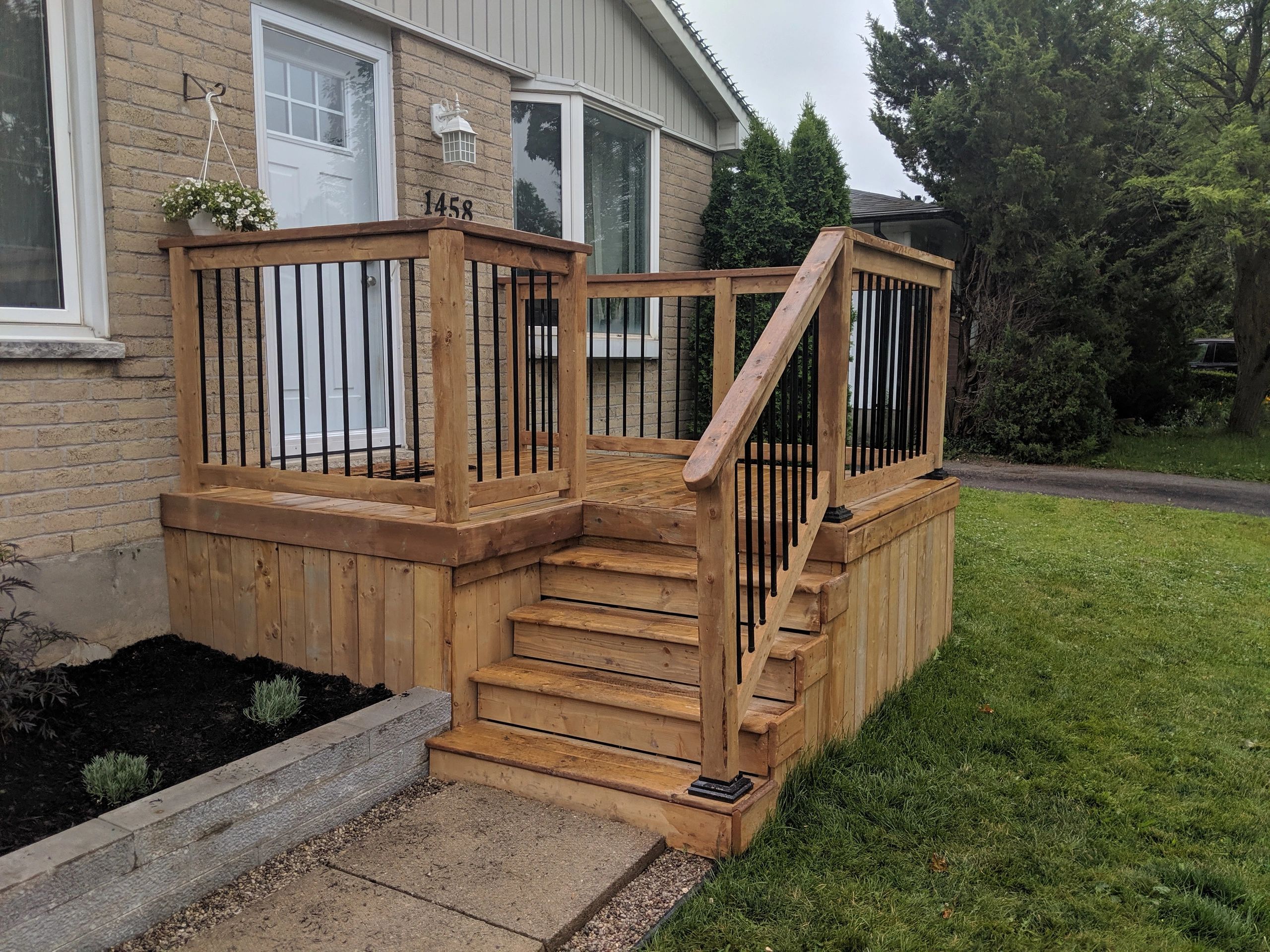 Front porch deck with sitting area built in London Ontario