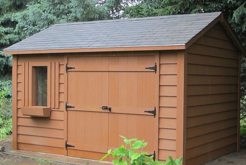 Custom shed with double doors built by Forrest City Fencing London Ontario
