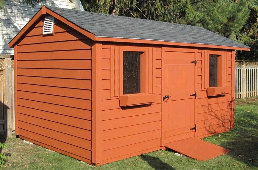 Pine shed with double windows custom built by Forrest City Fencing