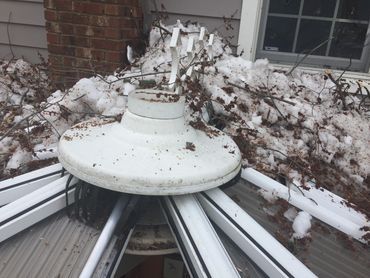 sunroom damage from fallen tree before and after