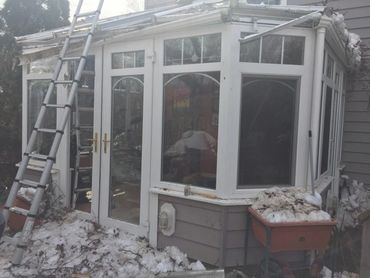 sunroom damage from fallen tree before and after