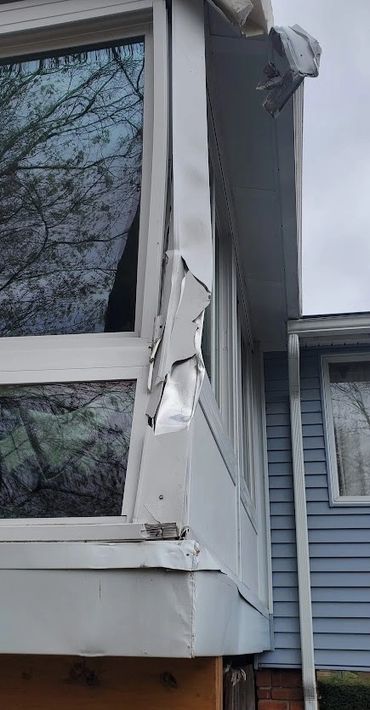  sunroom damage from fallen tree