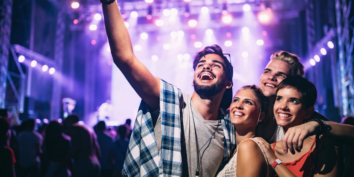 Group of friends out at a nightclub taking a selfie