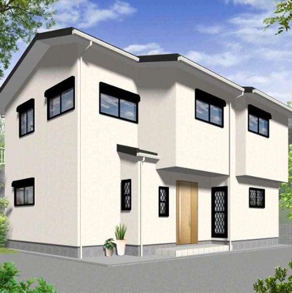 Modern two-story house with white walls and black window frames under a blue sky.