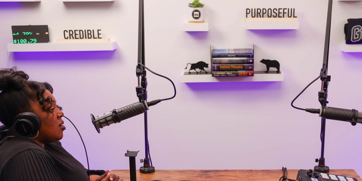 Group of people talking on a podcast.