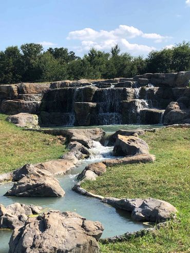 Concrete rock pond with waterfall