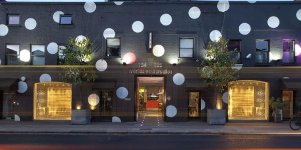 By Giorgio Hair Salon is inside Worlds End Studios, the building with white polka dots. 