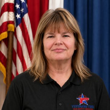 Woman in black polo with American flag background.