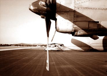 Side view of an airplane engine with propeller