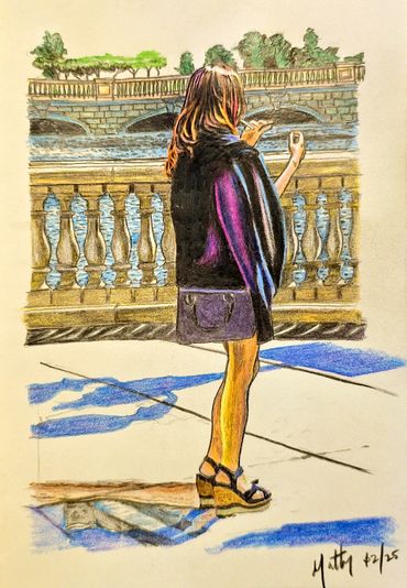 A woman standing with water and a bridge in the background