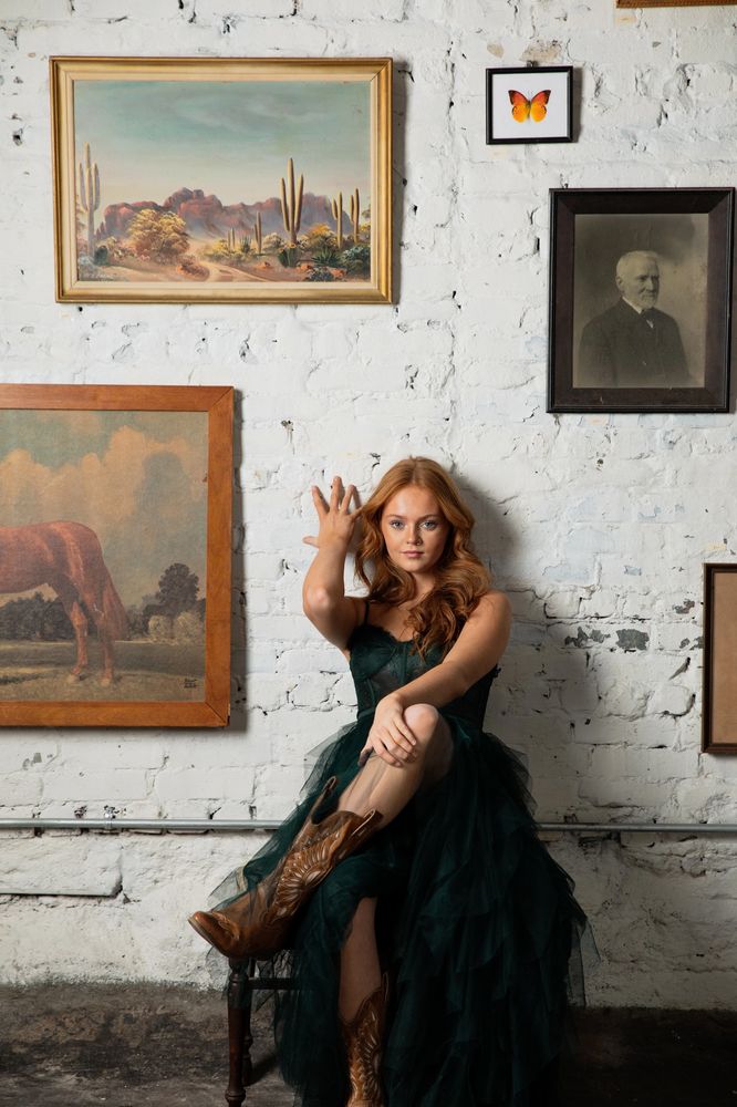 Country singer Neva Alden in tulle and cowboy boots

